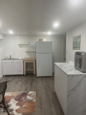 Another view of kitchen / dining from hallway