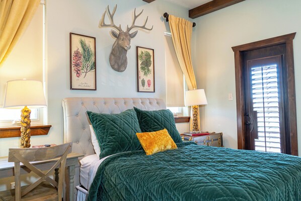 Cozy bedroom featuring a comfortable queen bed, with the option to add an extra queen-size air mattress for additional guests upon request. 

