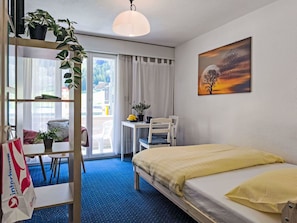 Furniture, Interior Design, Textile, Bedroom, Floor, Room, Flooring, Bed, Apartment, Bedding