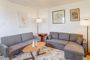 Living Room | Window A/C Unit | Central Heating | Full Sleeper Sofa