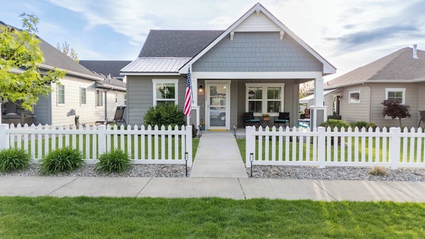 Step into Stay CDA Place, where boutique charm meets modern comfort. Relax on the cozy front porch....