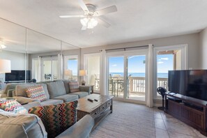Open concept living area with balcony access
