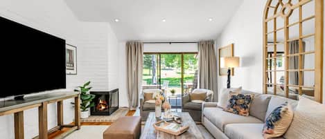 Afternoons by the fire, views of the green, and a space that feels like a warm hug. This living room is made for relaxing in style.