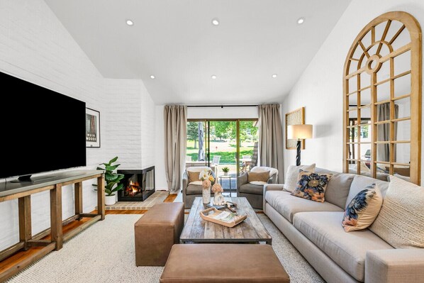 Afternoons by the fire, views of the green, and a space that feels like a warm hug. This living room is made for relaxing in style.
