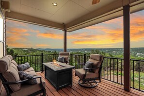Enjoy a cotton candy sunset around the firepit with company