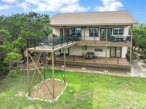 Breathtaking views from our elevated deck—perfect for morning coffee or sunset lounging at this peaceful hilltop retreat