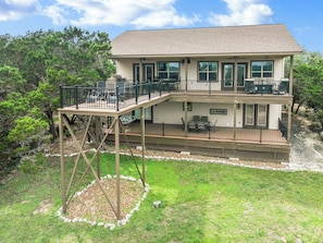 Breathtaking views from our elevated deck—perfect for morning coffee or sunset lounging at this peaceful hilltop retreat
