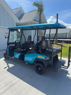 Six seater golf cart available with rental