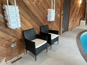 Pool room seating and towels.another