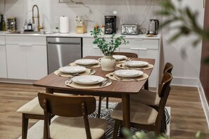 The dining area encourages you to gather with friends, enjoy a drink, and create lasting memories.
