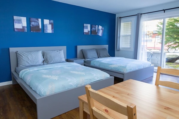 Cozy queen beds with fresh linens and comfy pillows