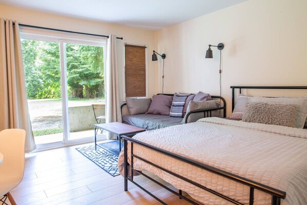 Bright open-concept living space with homey touches.