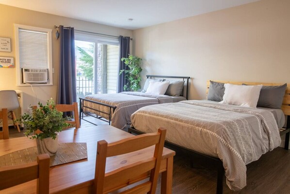 Cozy queen beds with fresh linens and comfy pillows.