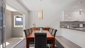 Dining, kitchen, balcony