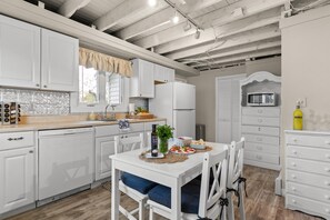Cook, chat, and savor the joy of this cozy kitchen!