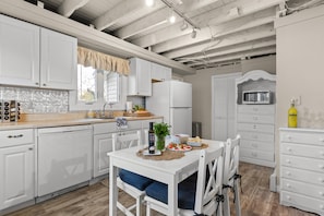 Cook, chat, and savor the joy of this cozy kitchen!