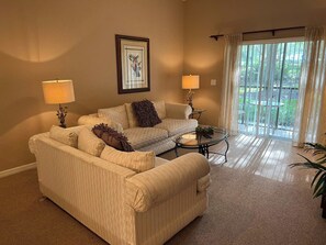 Living Room with Smart TV and patio access