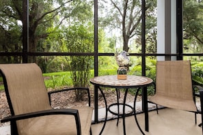 Enjoy the fresh air on the screened patio