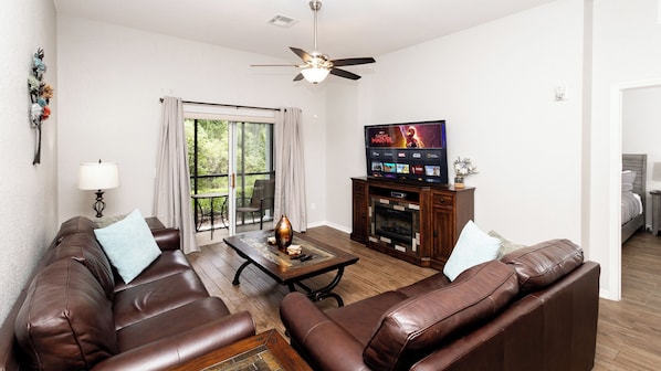 Living space with sofa sleeper and Smart TV