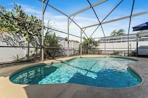 Make a splash in the private screened in pool