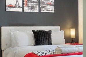 Make a statement in the Queen Cruella Bedroom, offering a Smart TV