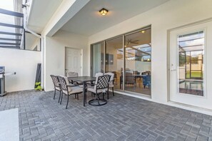 Outdoor dining by the pool
