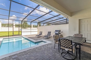 Outdoor dining by the pool