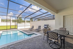 Outdoor dining by the pool