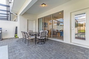 Outdoor dining by the pool