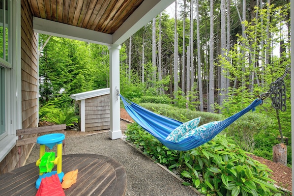 Hang in the backyard, enjoying the greenbelt and forest views.