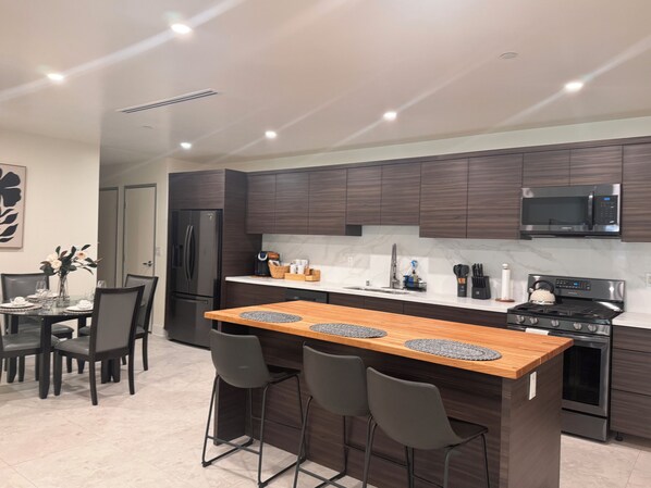 open kitchen with powered island