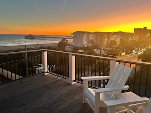 Stunning ocean and pier sunset views from the rooftop terrace as well