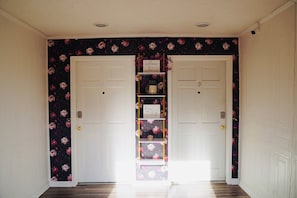 ENTRY DOOR TO INDIVIDUAL PRIVATE UNIT (LEFT)