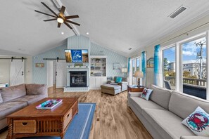 Top-Level Living Room with Deck Access
