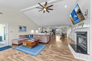 Top-Level Living Room with Deck Access