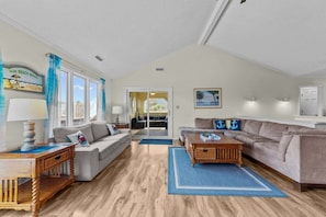 Top-Level Living Room with Deck Access