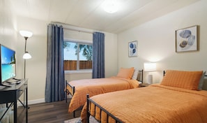 Twins room with smart tv and large storage area