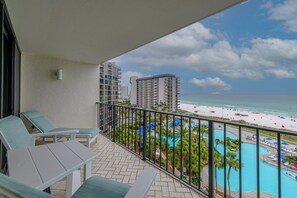 Private balcony overlooking the lagoon pool and beach