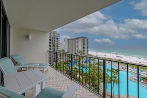 Private balcony overlooking the lagoon pool and beach