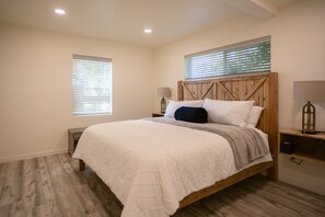 Comfortable king bed with rustic touches
