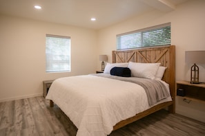 Comfortable king bed with rustic touches
