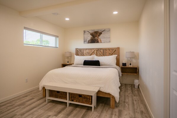 Rustic king suite with Highland cow art