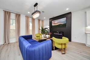 Bright, stylish, and full of life — this space is made for relaxation, content creation, or hosting in style.
