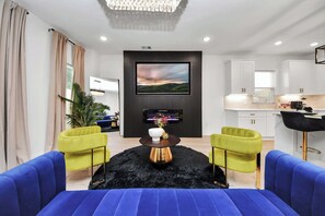 Kick back and enjoy the open layout, plush seating, and glowing ambiance that brings comfort to a whole new level.