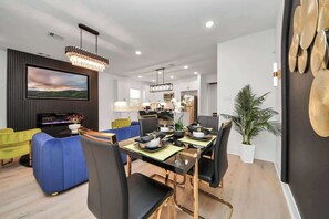 Gold accents and sleek black seating make every meal feel like fine dining. Elegant, modern, unforgettable.