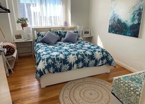 bedroom - comfy queen bed and views to the ocean