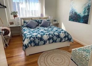 bedroom - comfy queen bed and views to the ocean