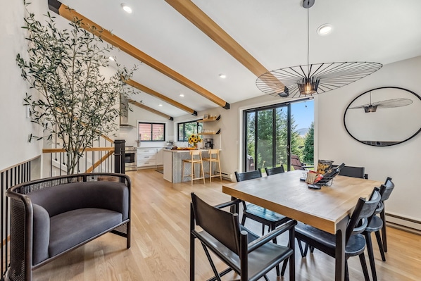 Cook, connect, and enjoy—this sleek kitchen and spacious dining room are designed for unforgettable gatherings.