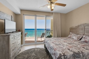 Gulf front master bedroom with a king size bed.
