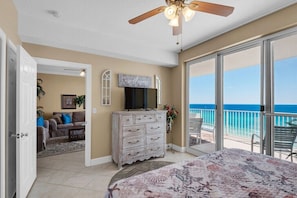 Gulf front master bedroom with a king size bed.
